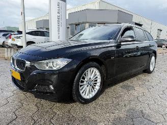 Coche accidentado BMW 3-serie Touring 320i Upgrade Edition 2014/2