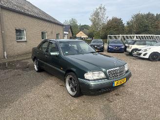 Vaurioauto  passenger cars Mercedes C-klasse 180 Sport AUTOMAAT 1994/7