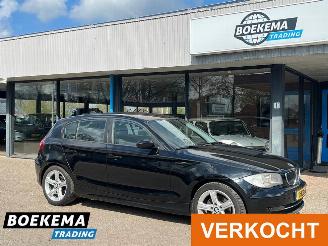 Vaurioauto  passenger cars BMW 1-serie 116i Business Line Cruise Climate Trekhaak 2009/10