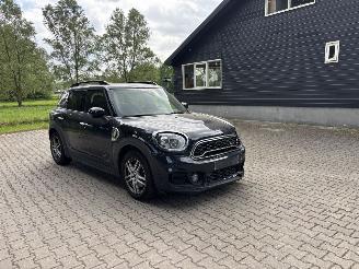 Damaged car Mini Countryman COOPER SPORT HYBRIDE PLUG IN SE 4AWD AUTOMAAT NAVI CLIMA LEER LED PDC STOELVERW B.J 12-2019 2019/12