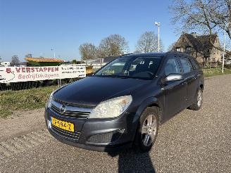 damaged passenger cars Opel Astra STATION WAGON 1.7 CDTI BUSINESS 2009/6